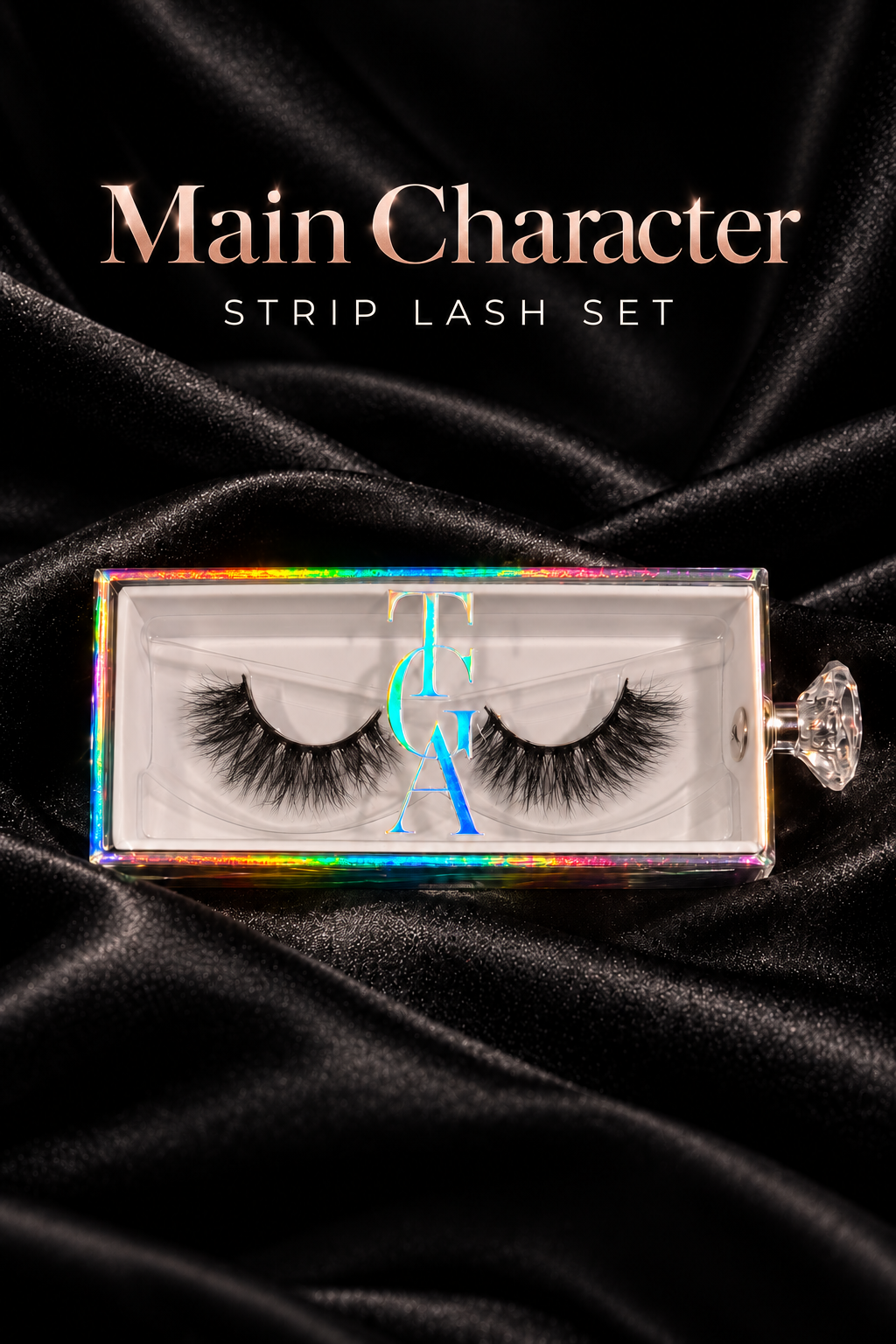 Main Character dramatic wispy strip lashes in holographic box on black silk